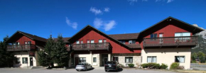 Гостиница Bighorn Inn & Suites  Кэнмор
